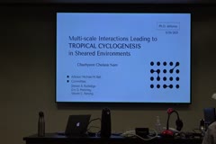 Multi-scale Interactions Leading to Tropical Cyclogenesis in Sheared Environments